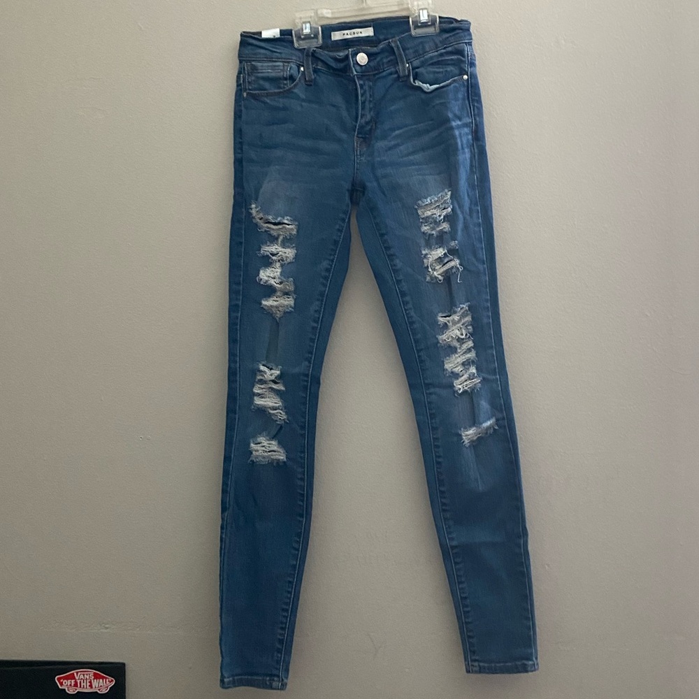 These are low rise, ripped jeans